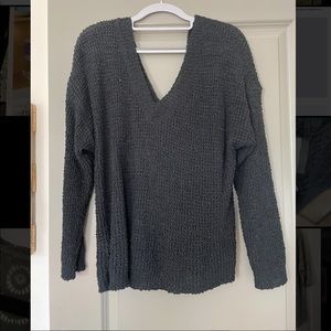 Black crochet sweater with open twisted back